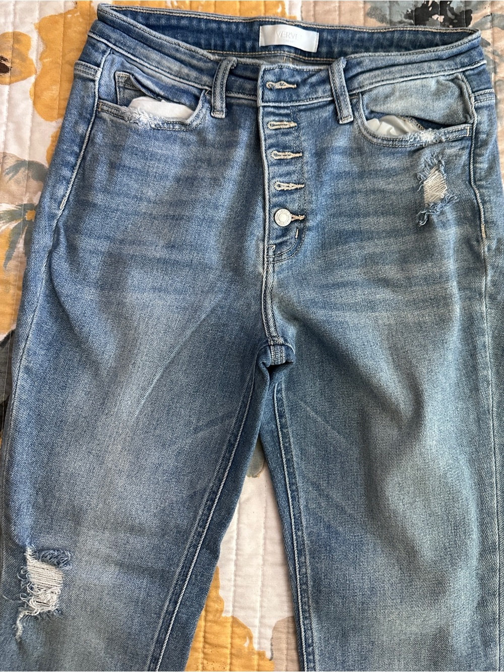 Women’s High-Rise Distressed Jeans in Light Blue Wash